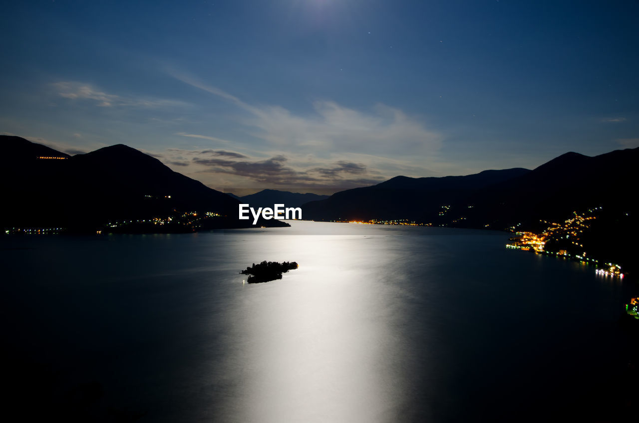 Scenic view of mountain against sky at night