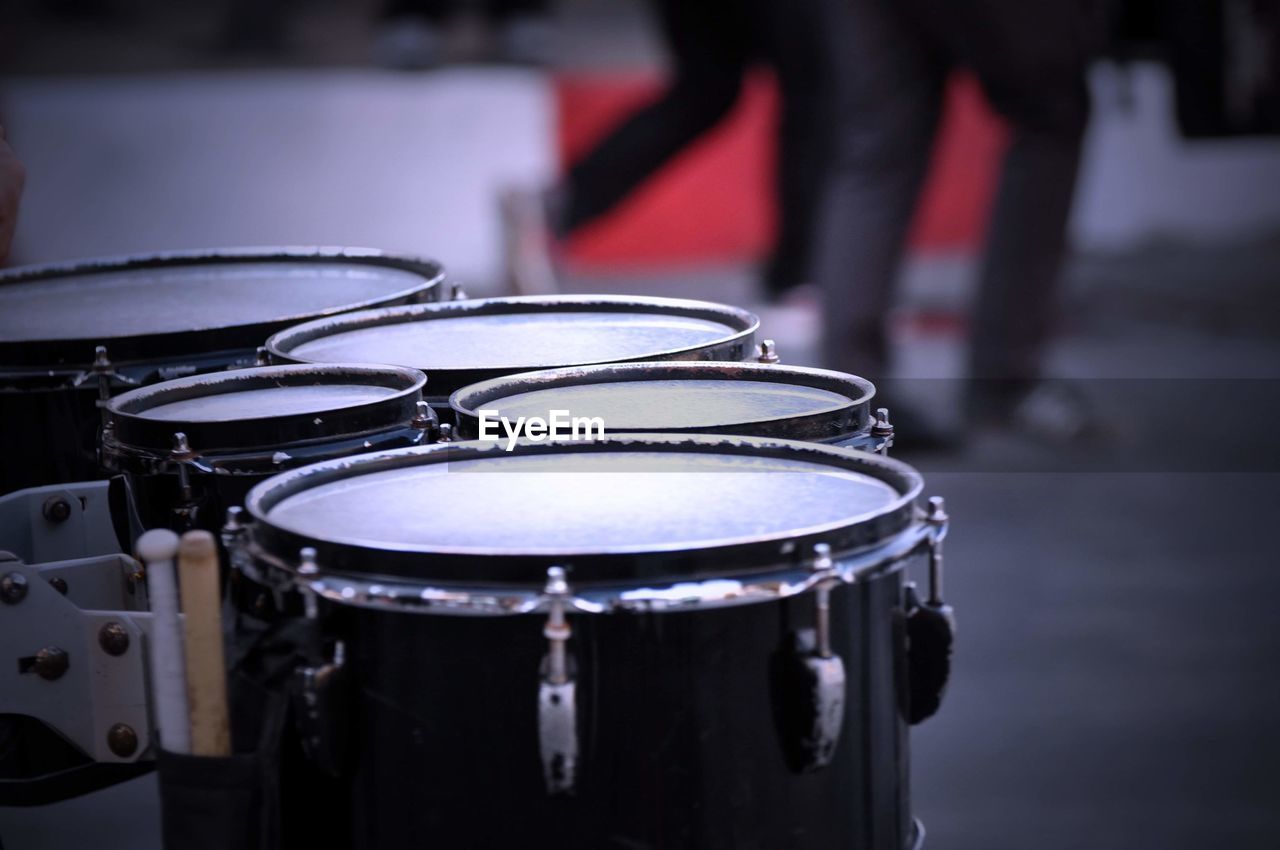 Close-up of drums on road