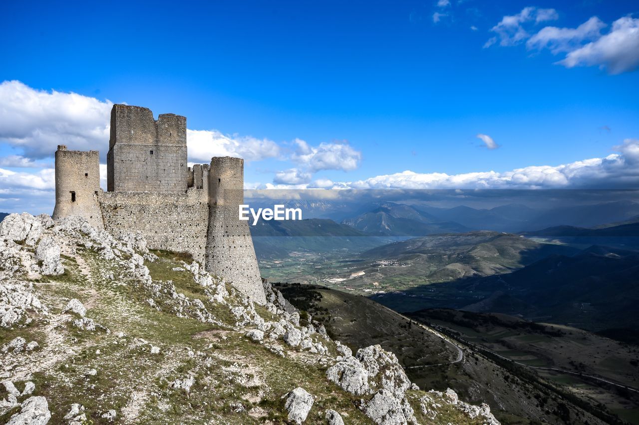 SCENIC VIEW OF MOUNTAIN AGAINST SKY