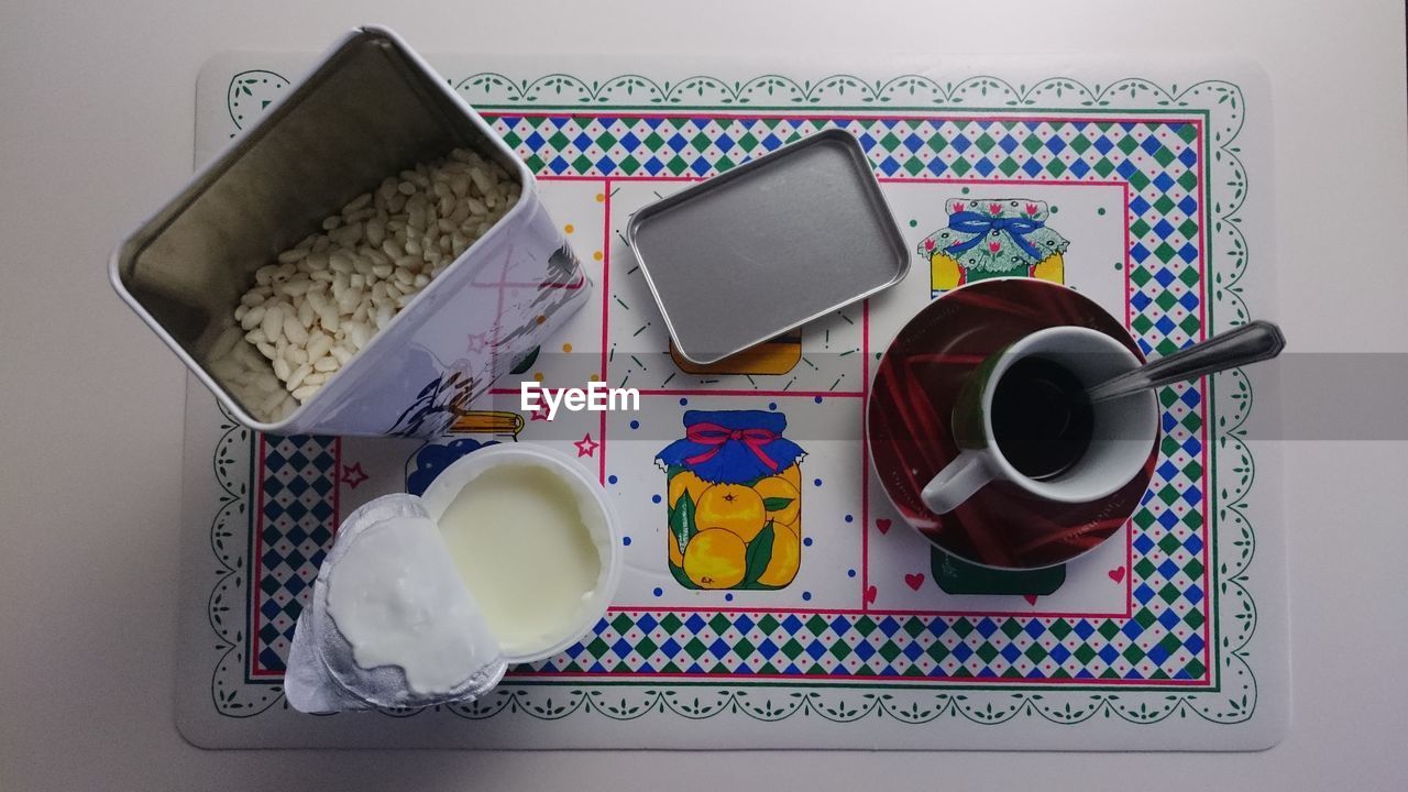 High angle view of coffee cup on table