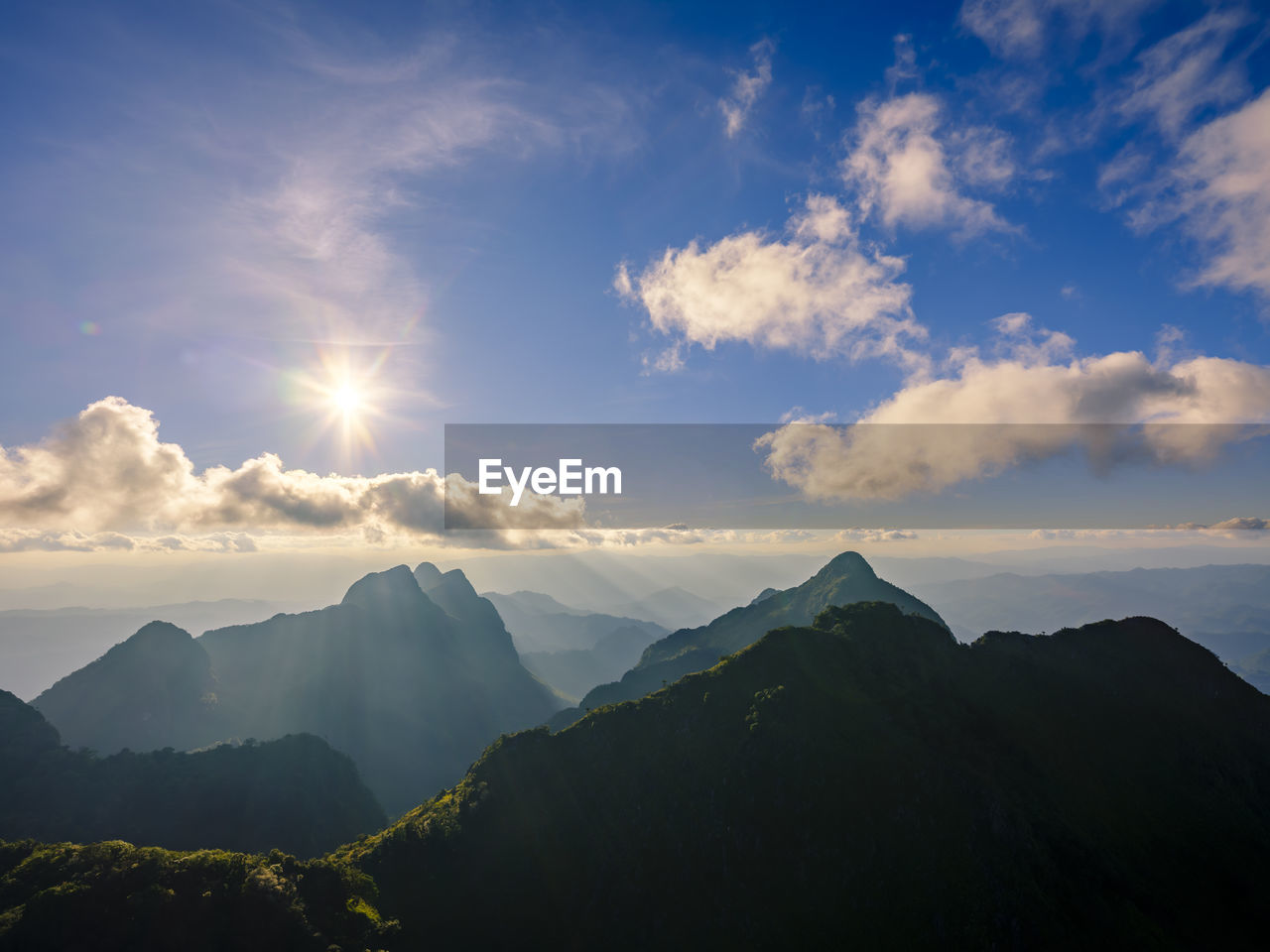 Scenic view of silhouette mountains against sky