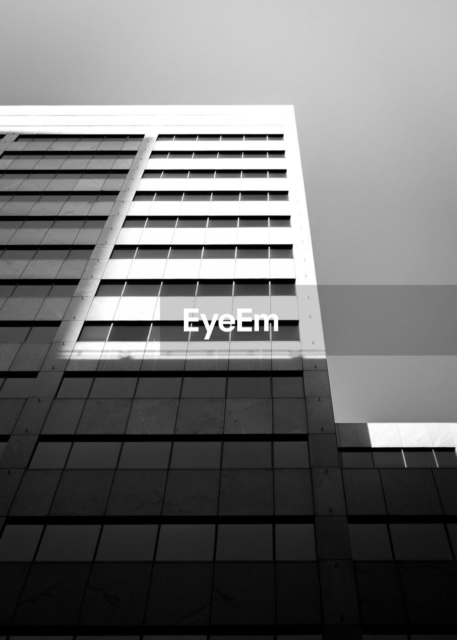 Low angle view of modern building against clear sky