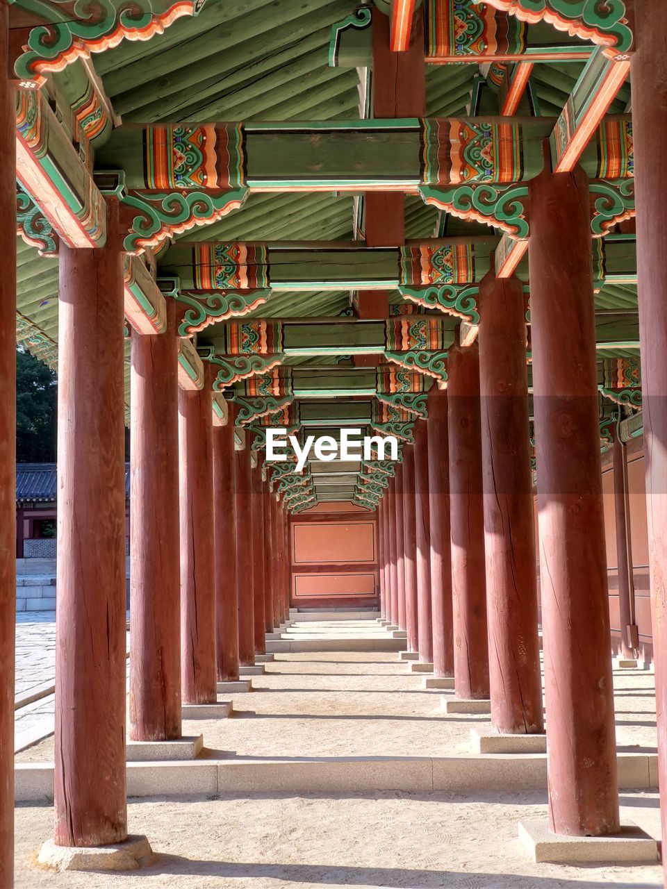Interior of palace building, palace corridor with beautiful dancheong and pillars in korea