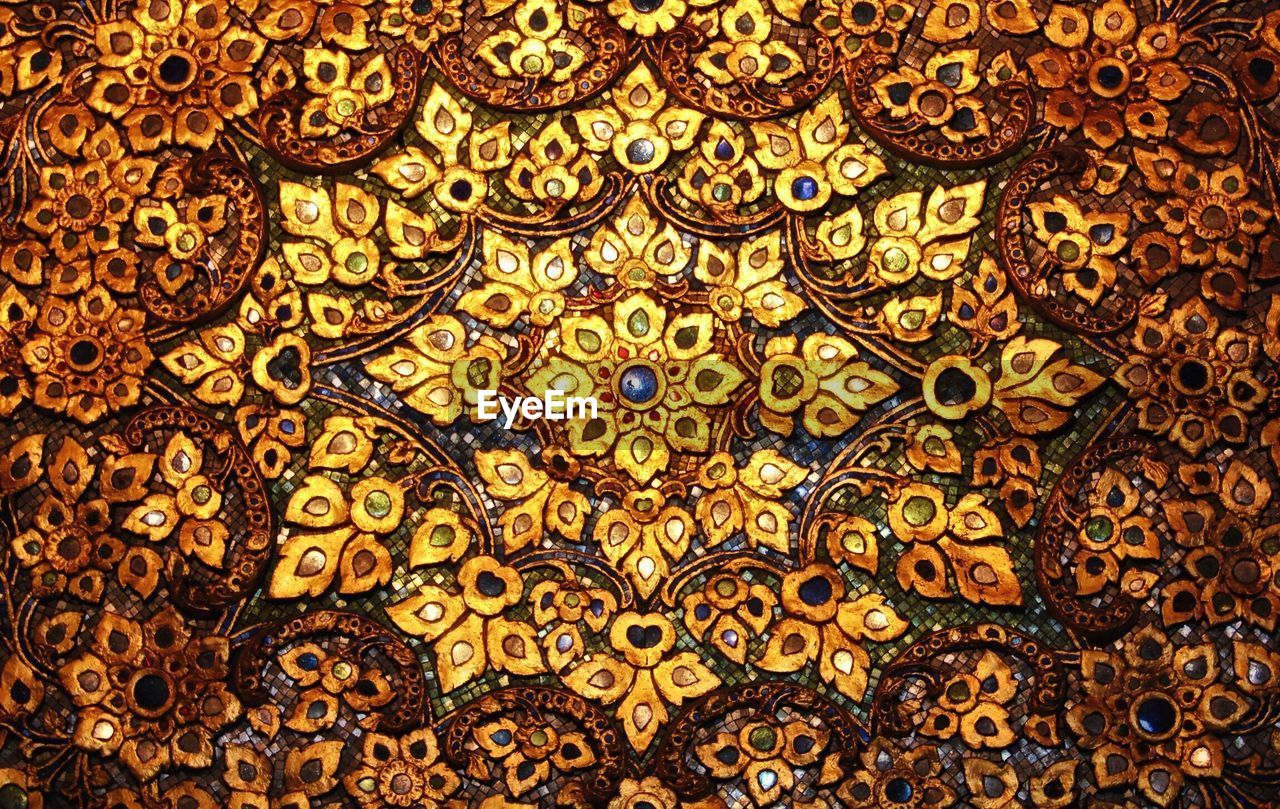 Full frame shot of gold floral pattern