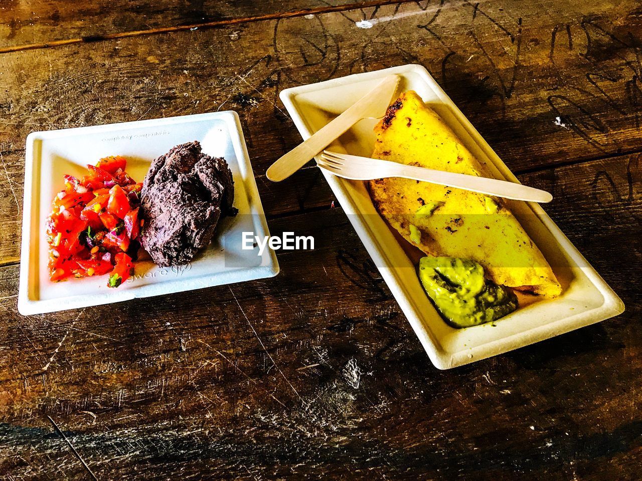 HIGH ANGLE VIEW OF FRUITS SERVED ON TABLE