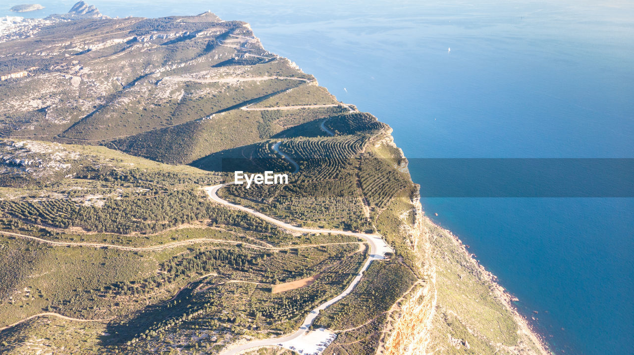 High angle view of sea and mountains