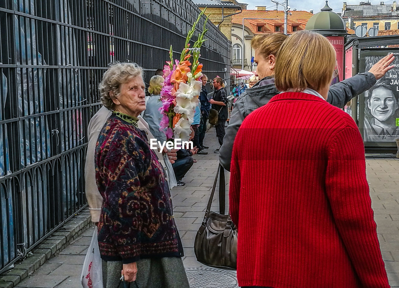 WOMAN WALKING ON STREET