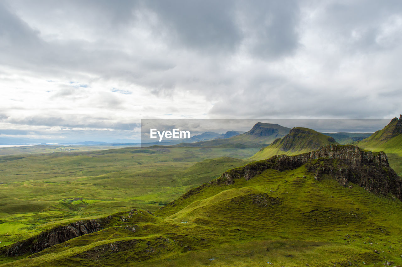 View of landscape against cloudy sky