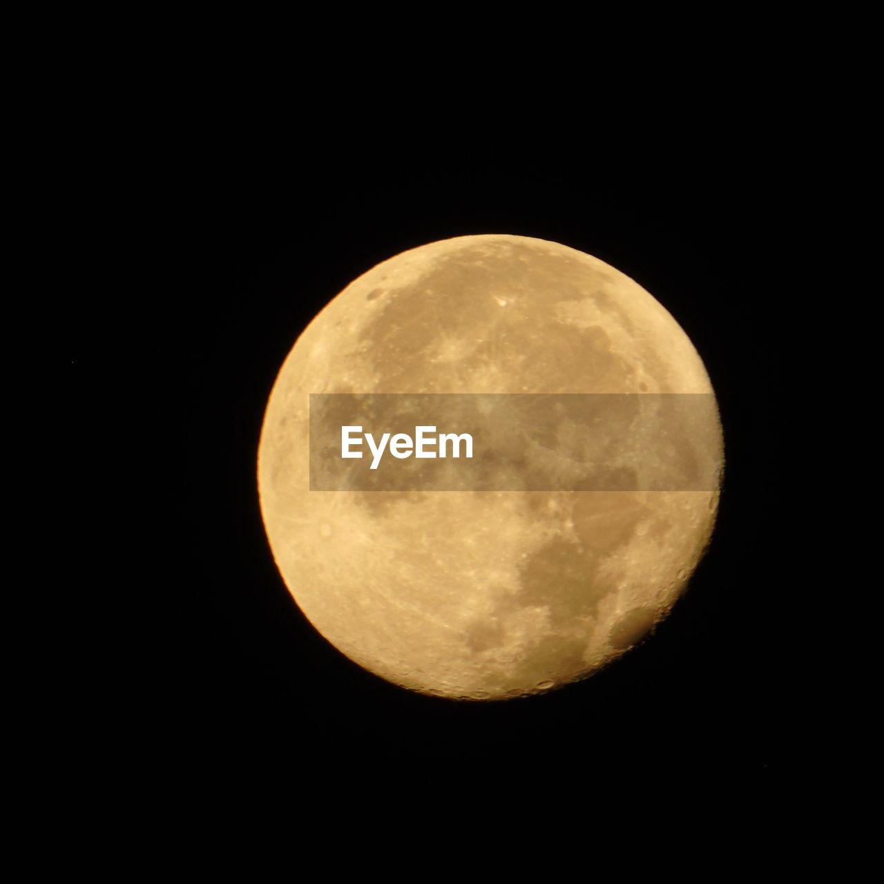 LOW ANGLE VIEW OF MOON AGAINST CLEAR SKY