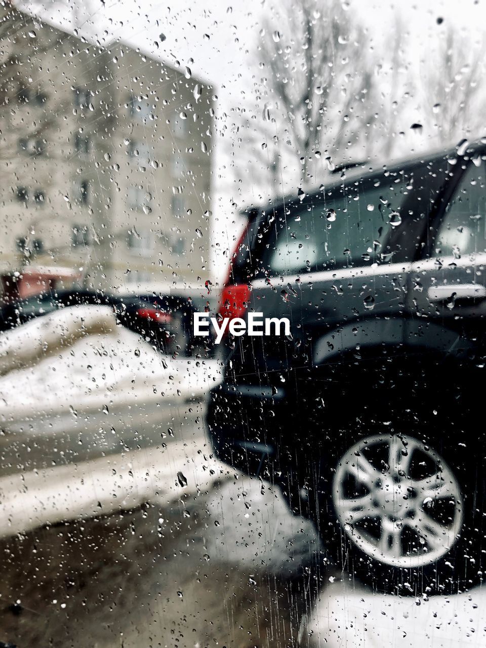 RAIN DROPS ON GLASS WINDOW