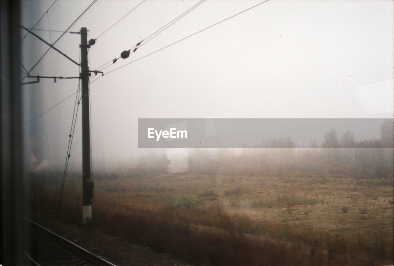 RAILROAD TRACKS AGAINST SKY