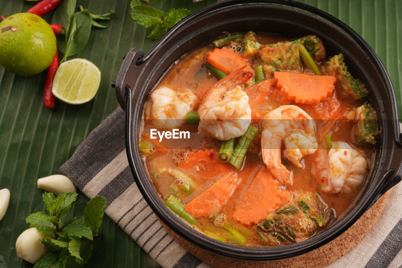 High angle view of thai food in bowl on table