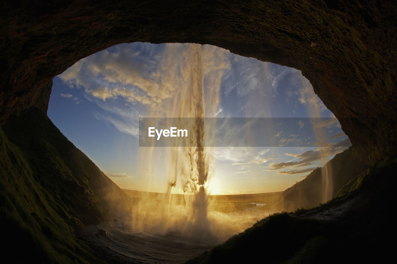 Looking out from behind the waterfall seljalandsfoss