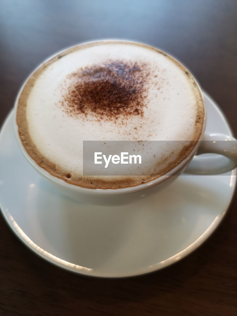 CLOSE-UP OF COFFEE ON TABLE