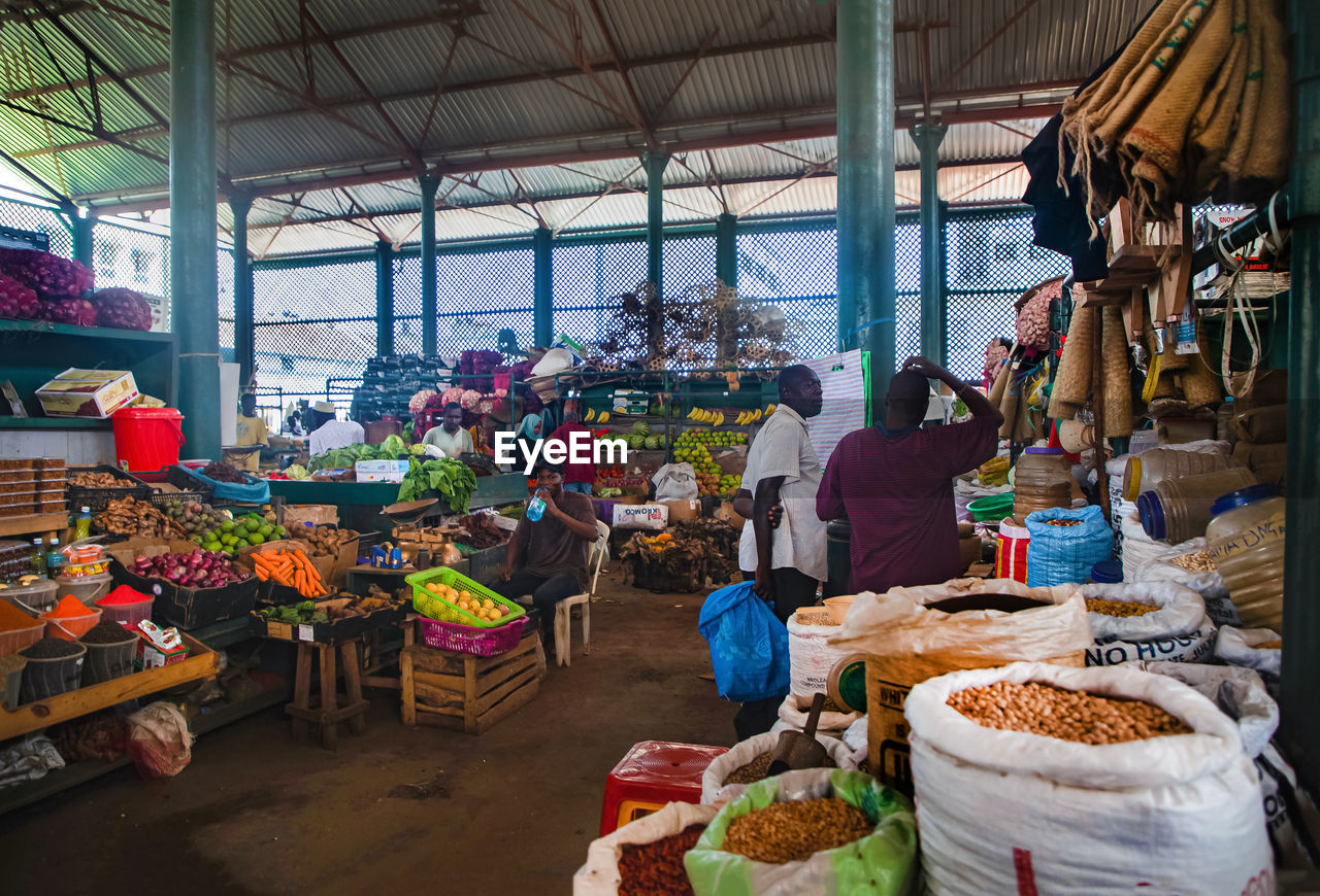 GROUP OF PEOPLE AT MARKET