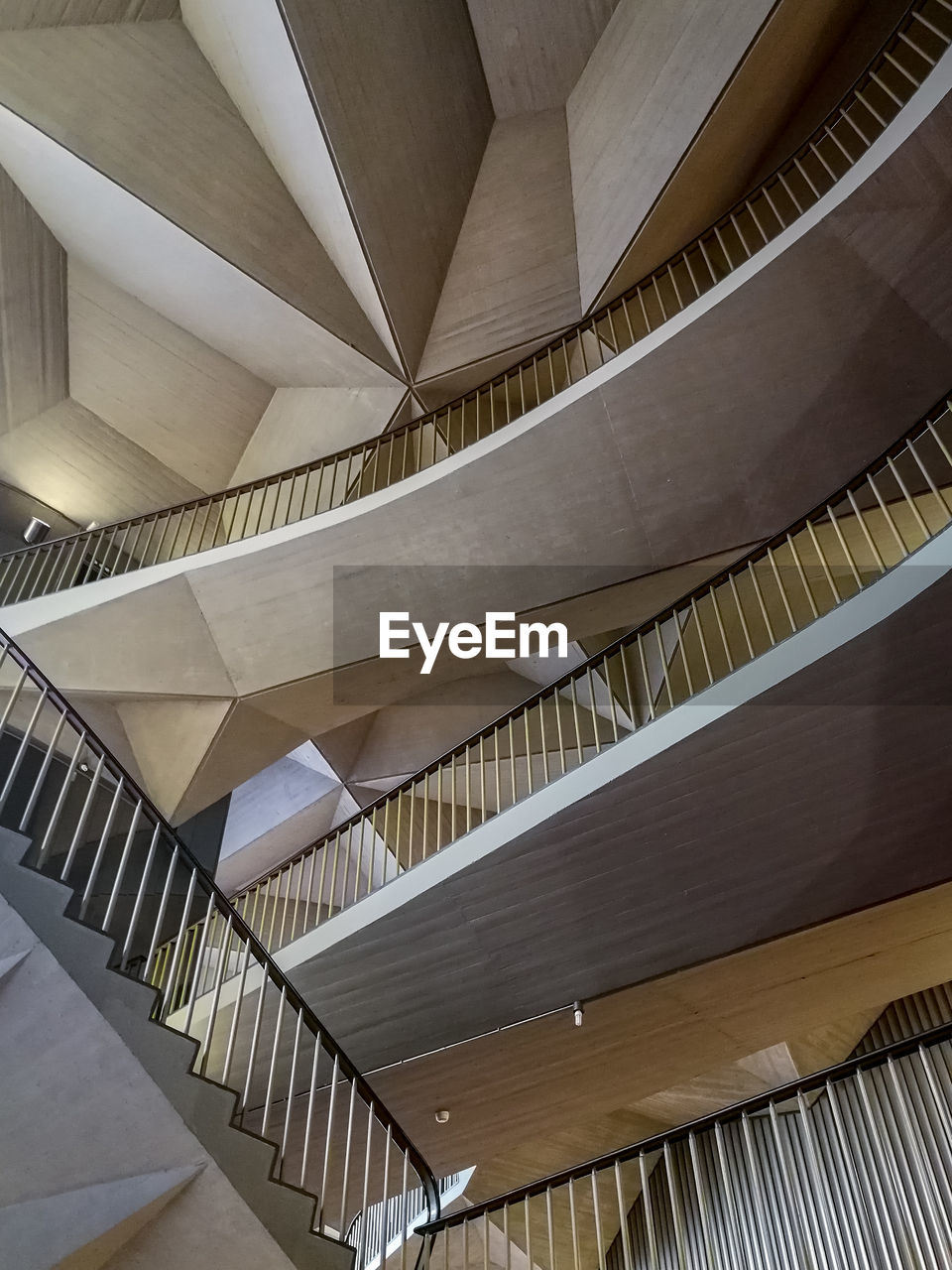 LOW ANGLE VIEW OF STAIRCASES IN BUILDING