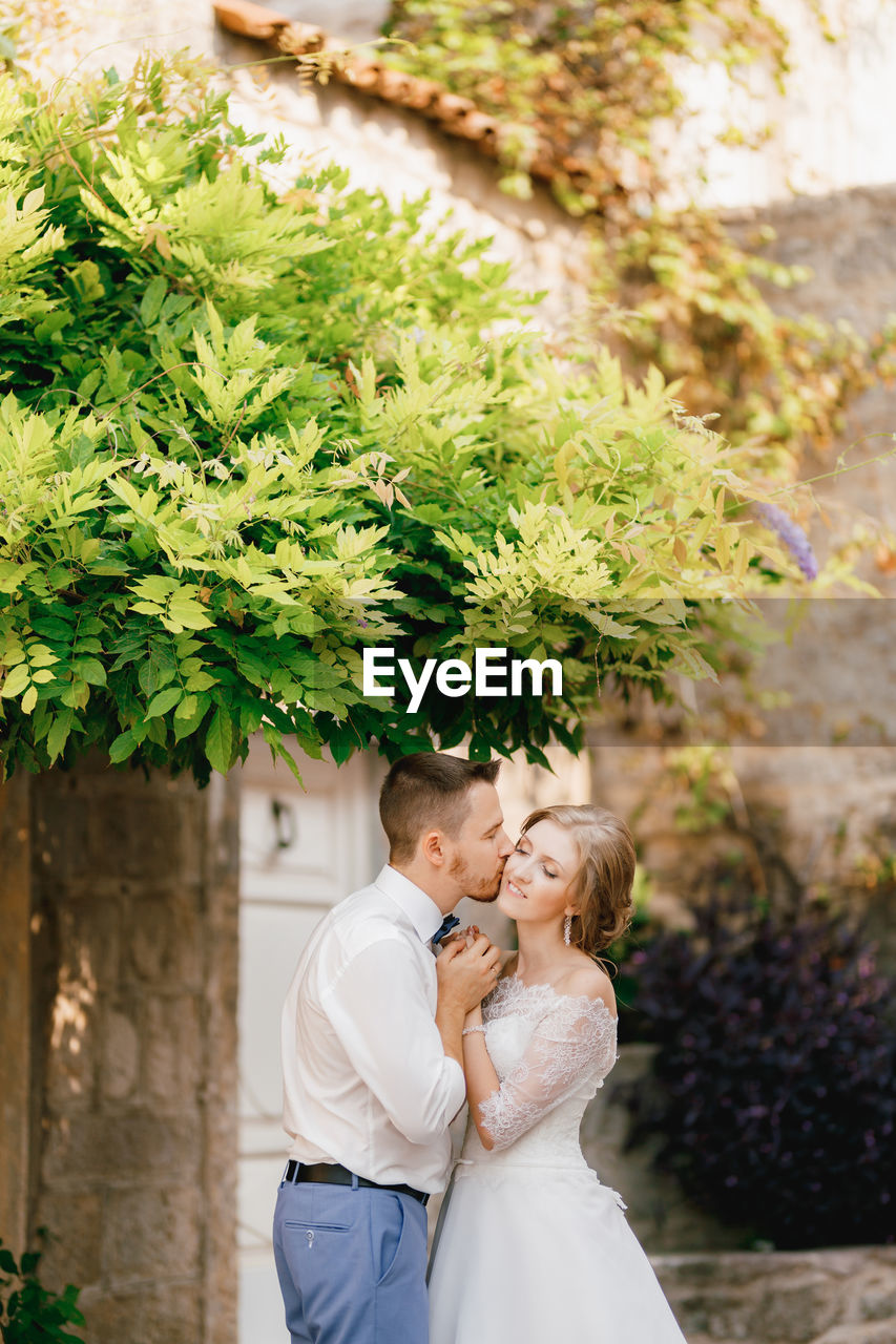 Young couple standing outdoors