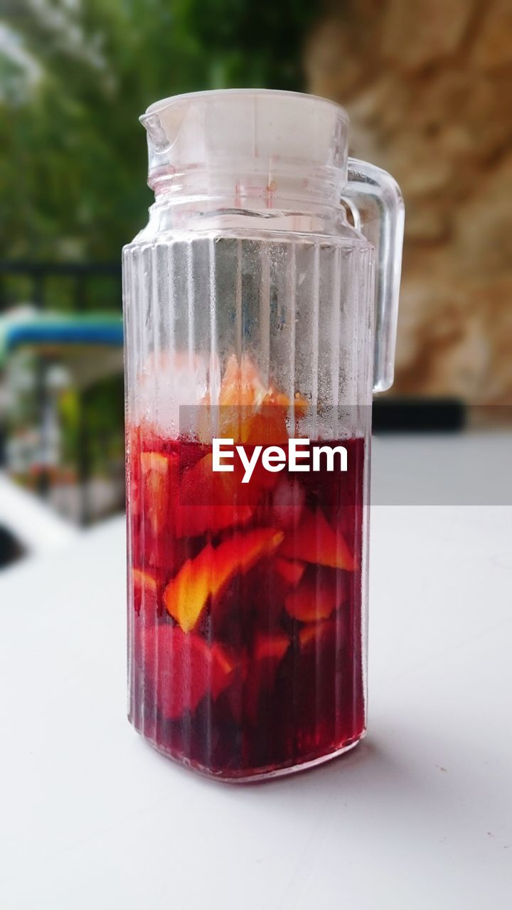 Close-up of drink in jar on table