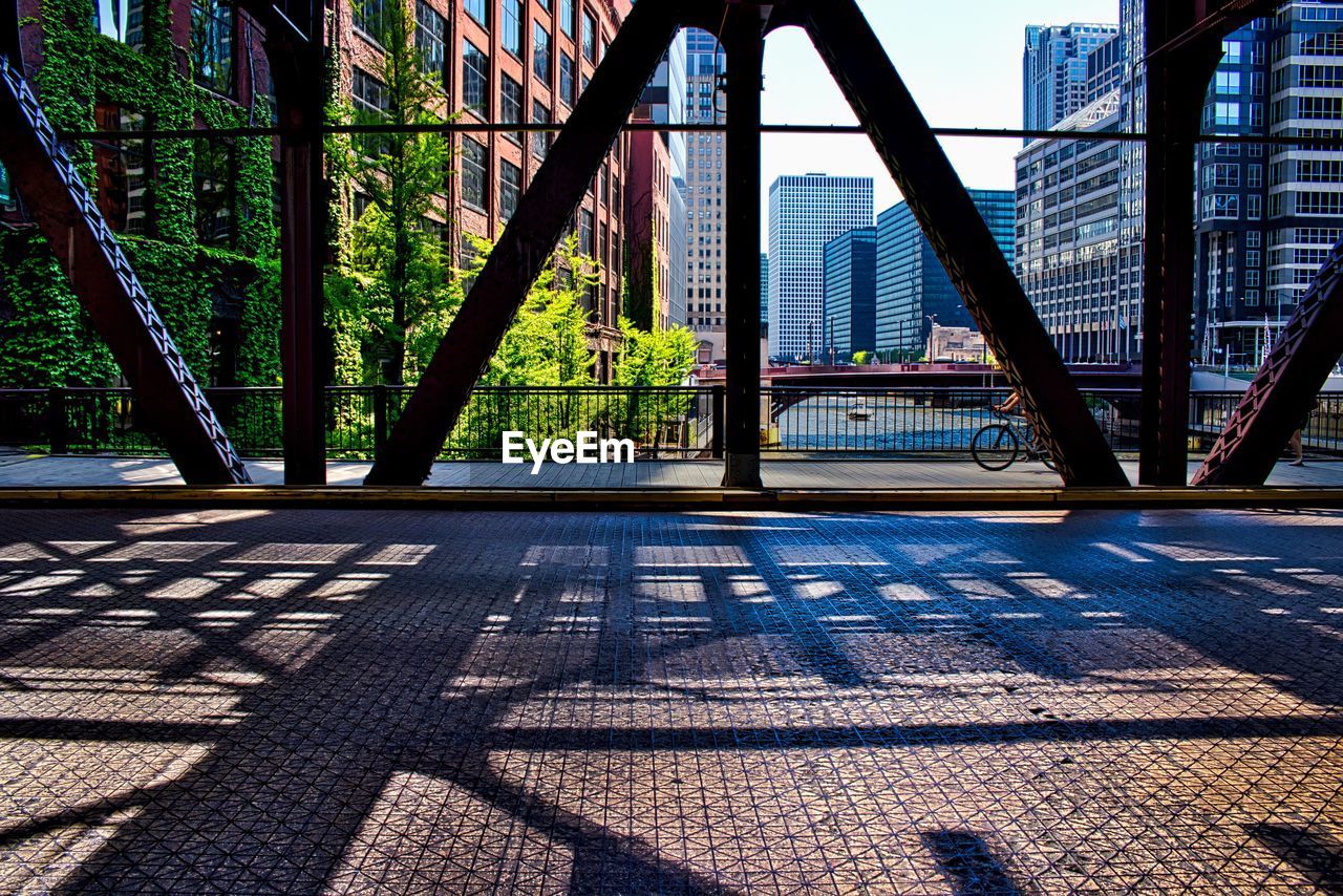 SHADOW OF BRIDGE ON BUILDING