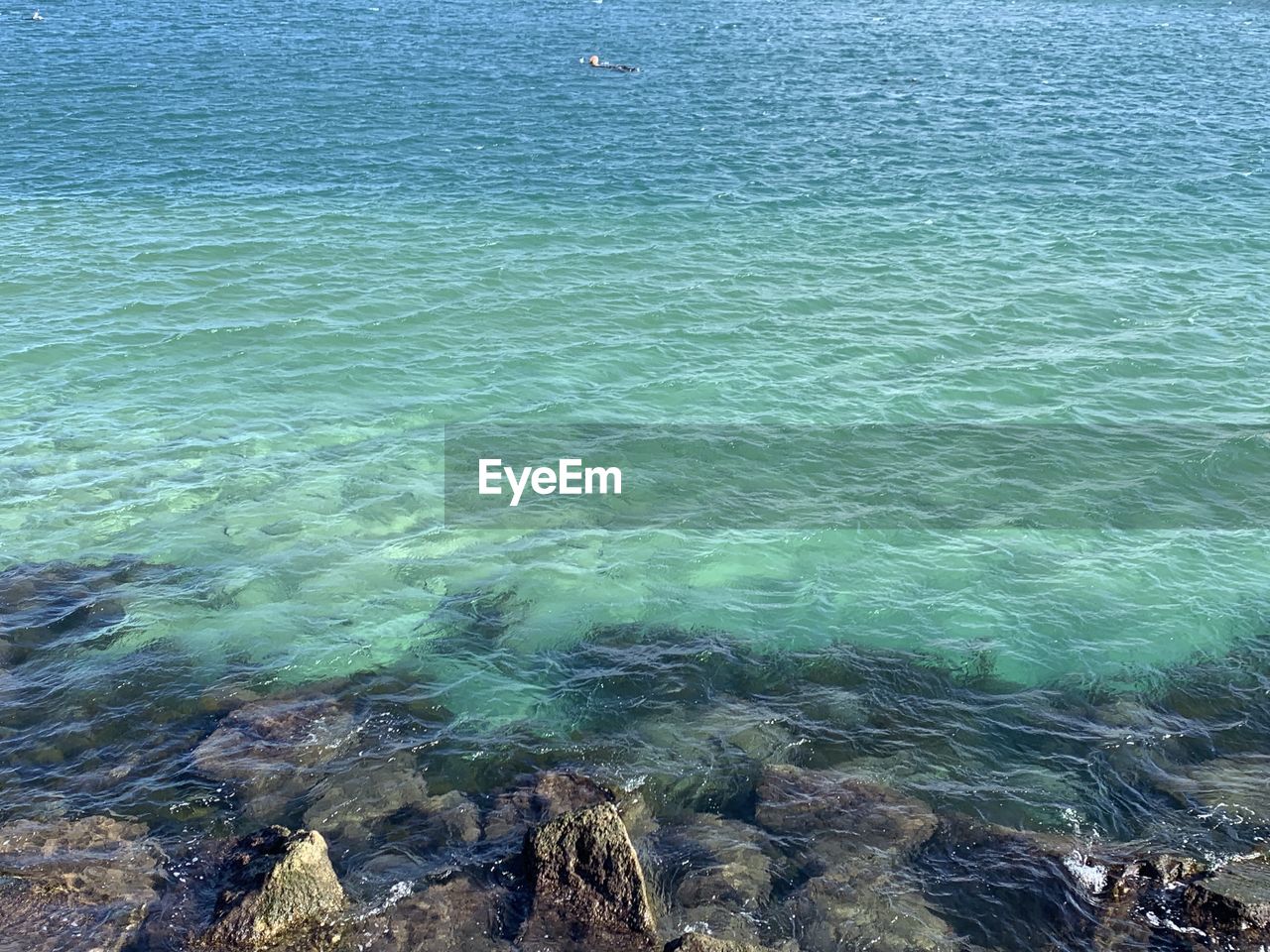 water, sea, beauty in nature, shore, ocean, coast, tranquility, scenics - nature, day, nature, high angle view, tranquil scene, no people, land, body of water, reef, beach, idyllic, rippled, rock, wind wave, outdoors, wave, blue, bay, terrain, sunlight, non-urban scene, turquoise colored, coral reef