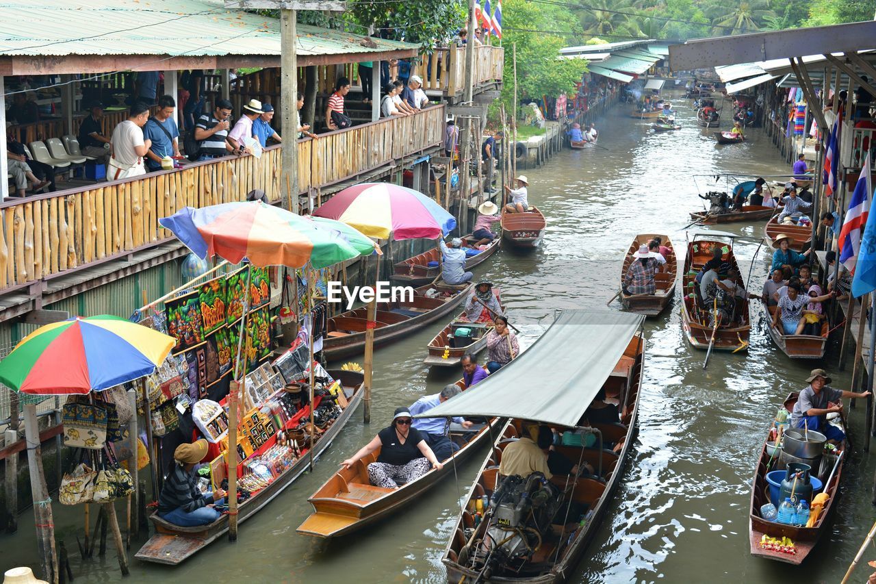 High angle view of people in boats at floating market