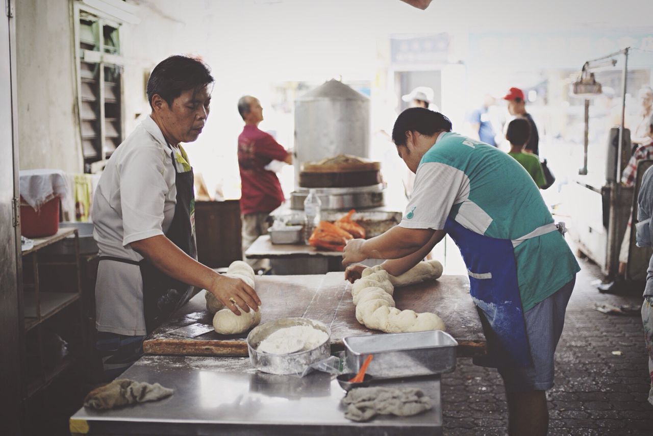 PEOPLE WORKING ON FOOD