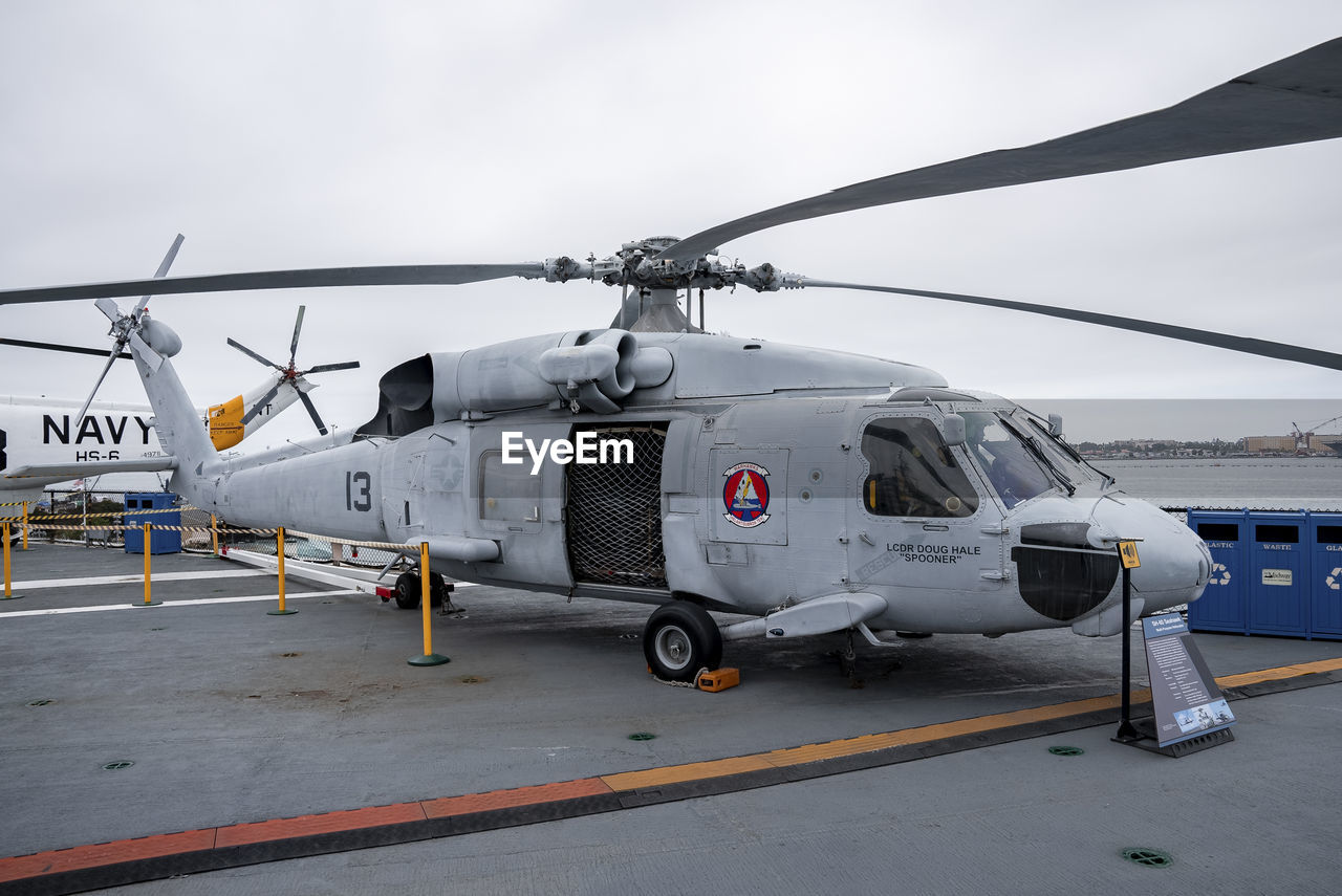 helicopter, transportation, mode of transportation, air vehicle, rotorcraft, vehicle, airplane, aircraft, helicopter rotor, aviation, military, military helicopter, airport, aerospace industry, business finance and industry, air force, business, army, sky, day, travel, occupation, nature