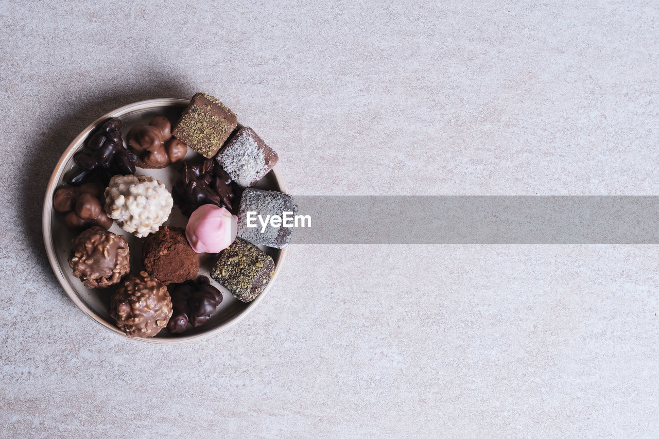 High angle view of rose in bowl on table