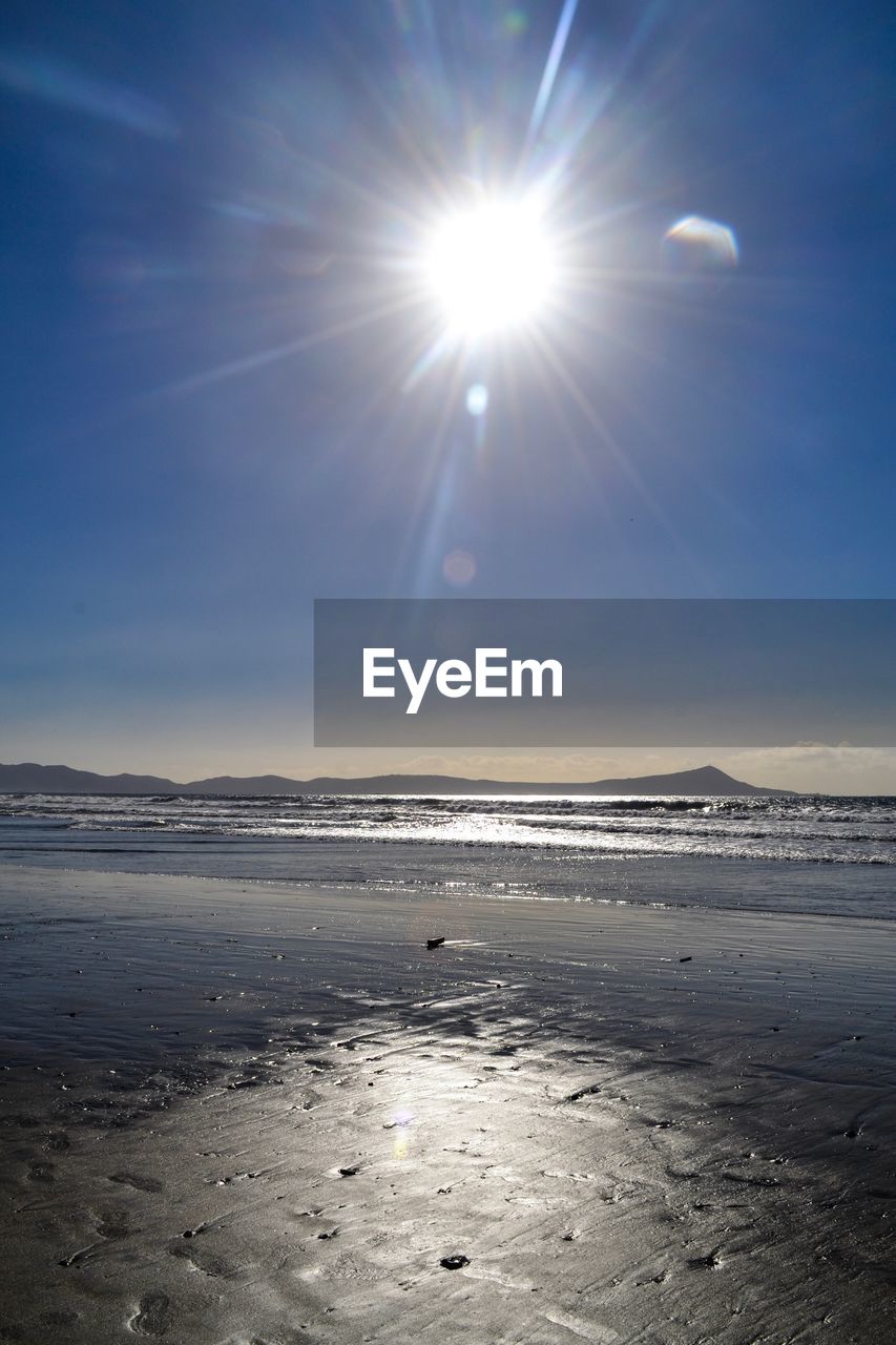 SCENIC VIEW OF SEA AGAINST SKY AT SUNSET