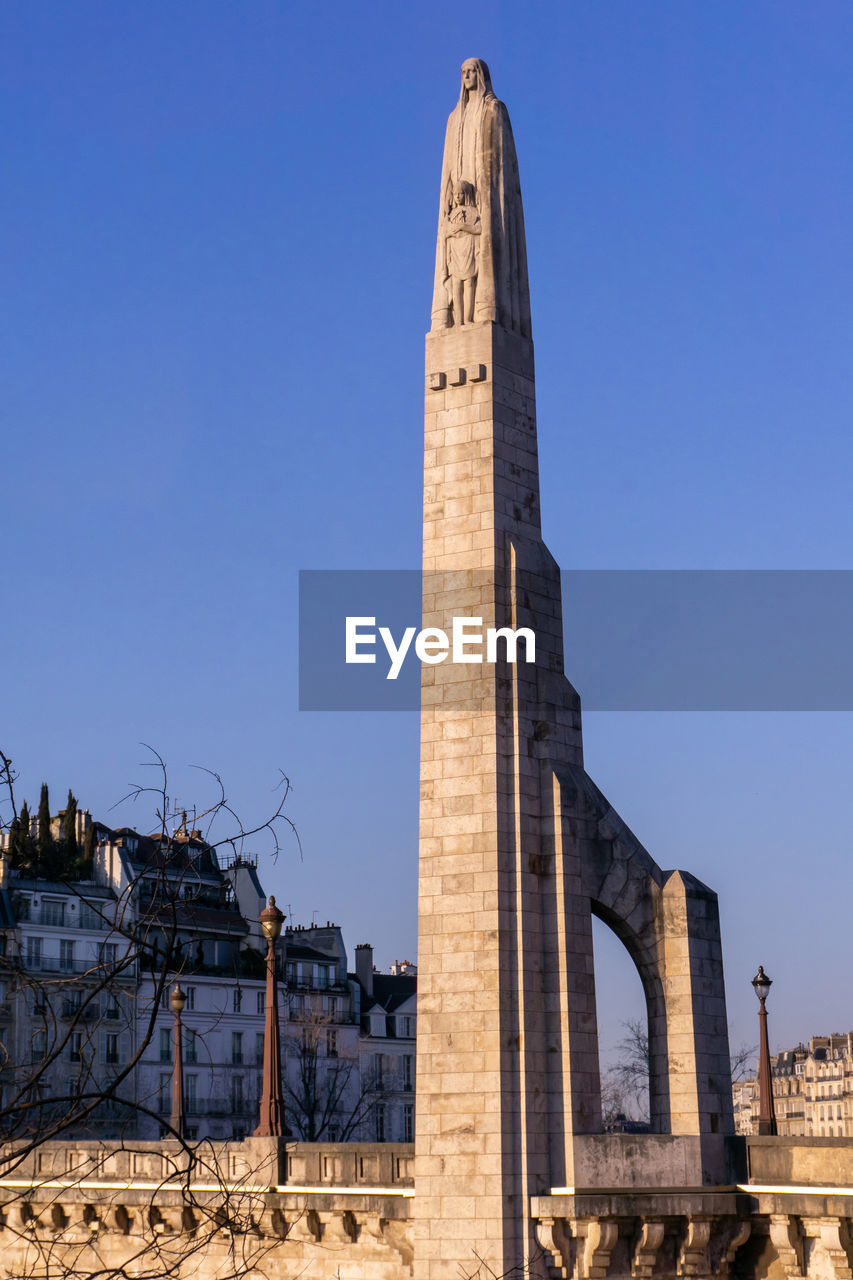 architecture, landmark, built structure, history, travel destinations, sky, the past, nature, monument, blue, building exterior, clear sky, travel, no people, city, sunny, tourism, ancient history, outdoors, day, tower, architectural column, memorial, building, ancient, obelisk