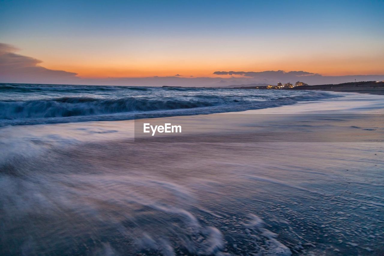 Scenic view of sea against sky during sunset