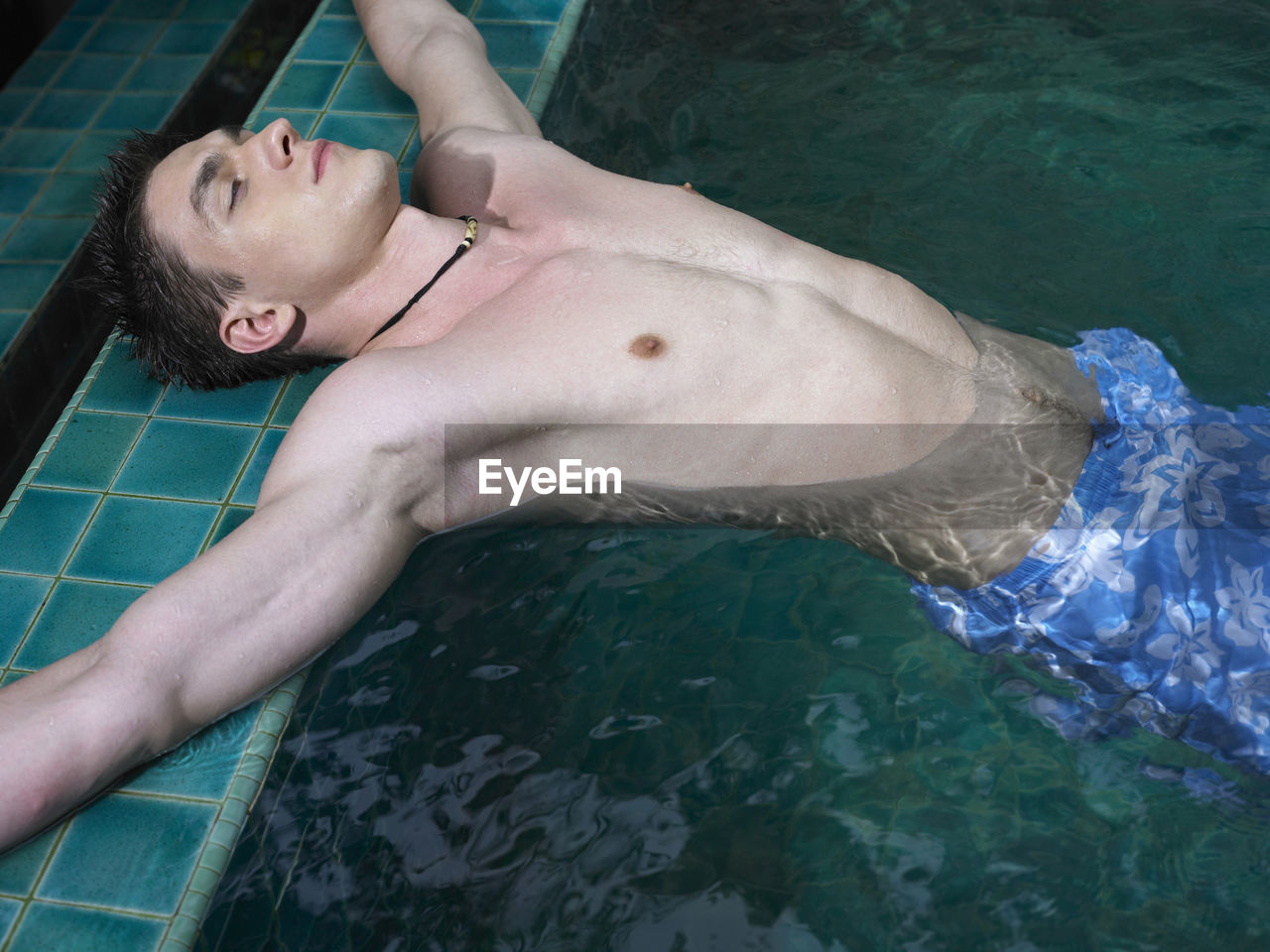 High angle view of man in swimming pool