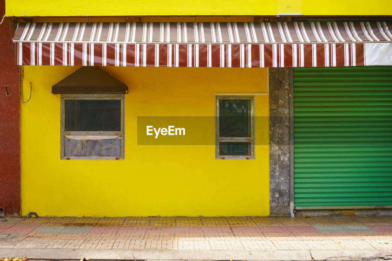 YELLOW WINDOWS ON BUILDING