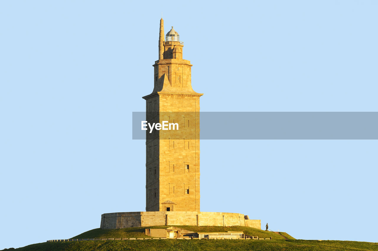 Tower of hercules against clear blue sky