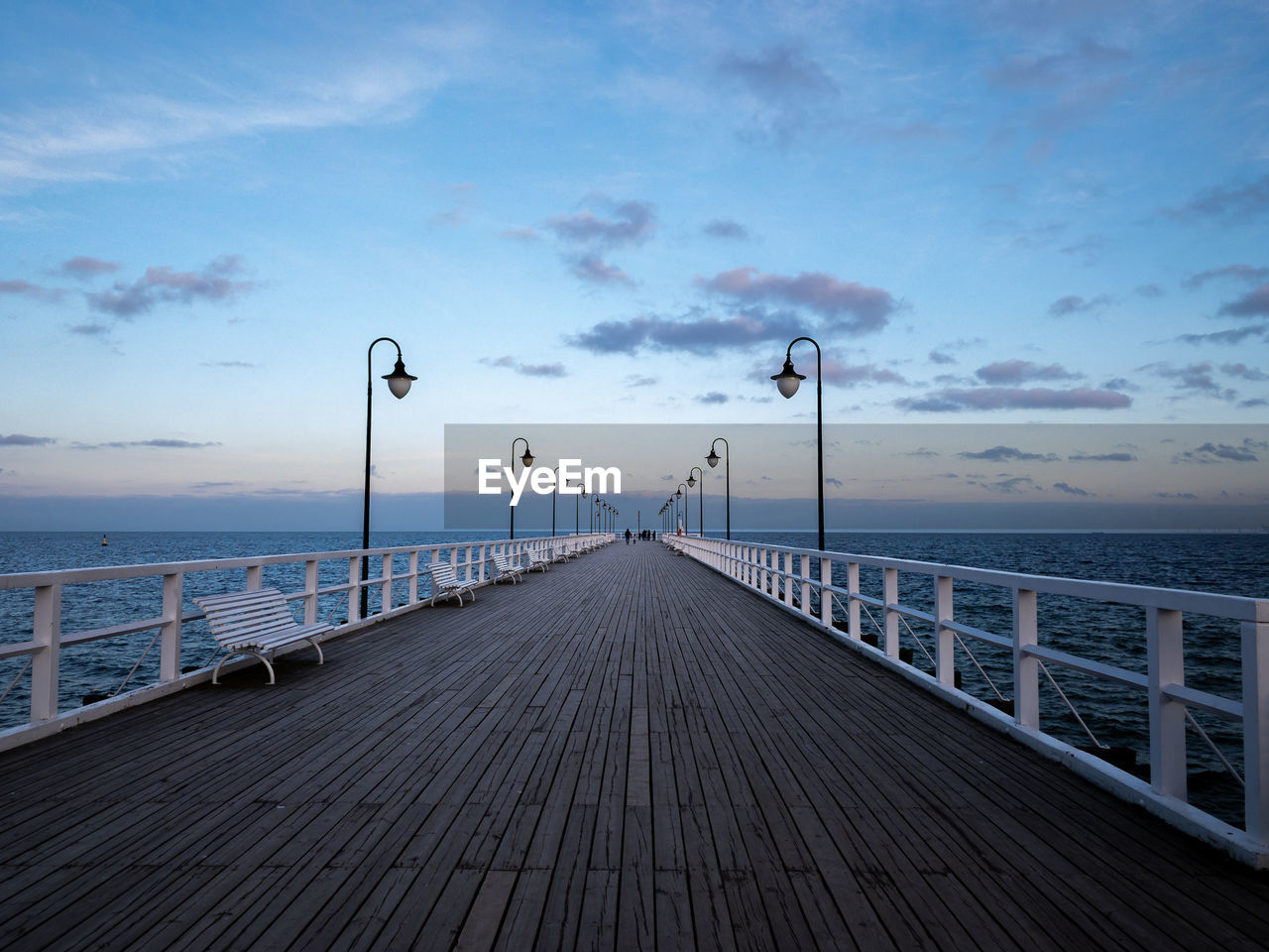 View of pier on sea against sky