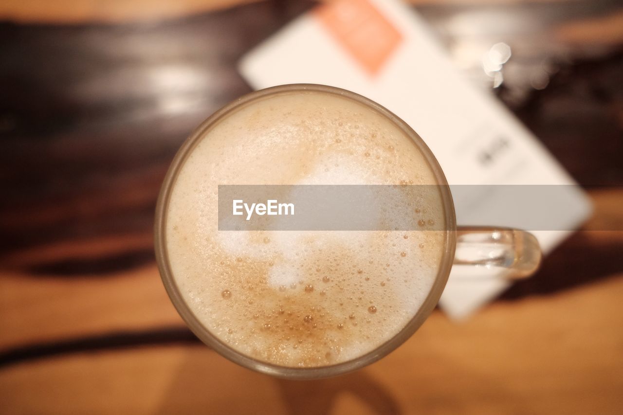 Close-up of cappuccino on table