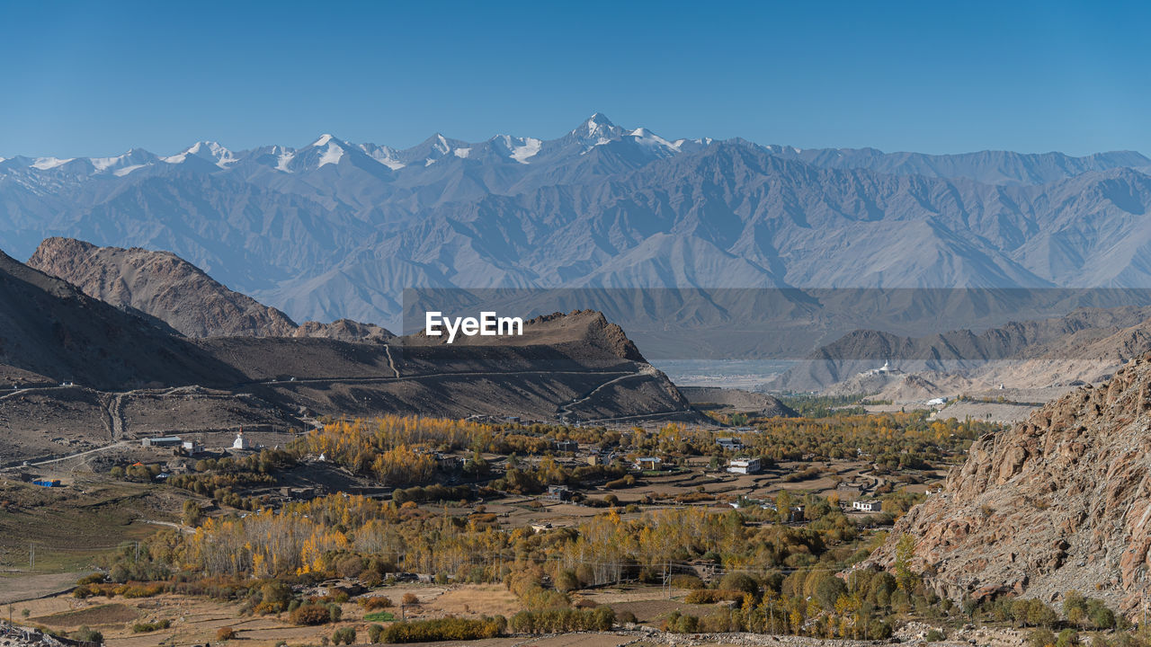 Leh city with snow capped mountain background scenery