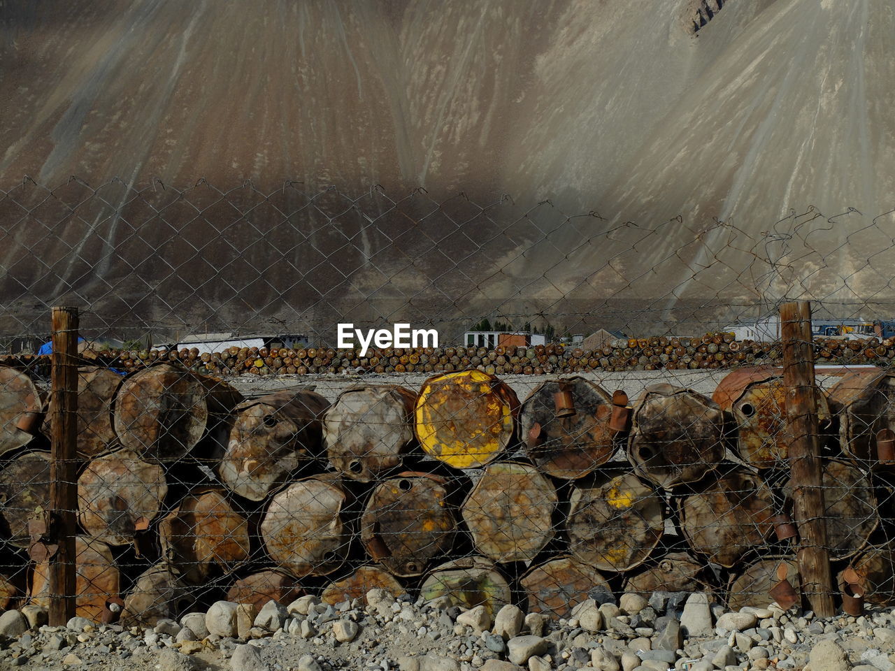 STACK OF LOGS BY FACTORY