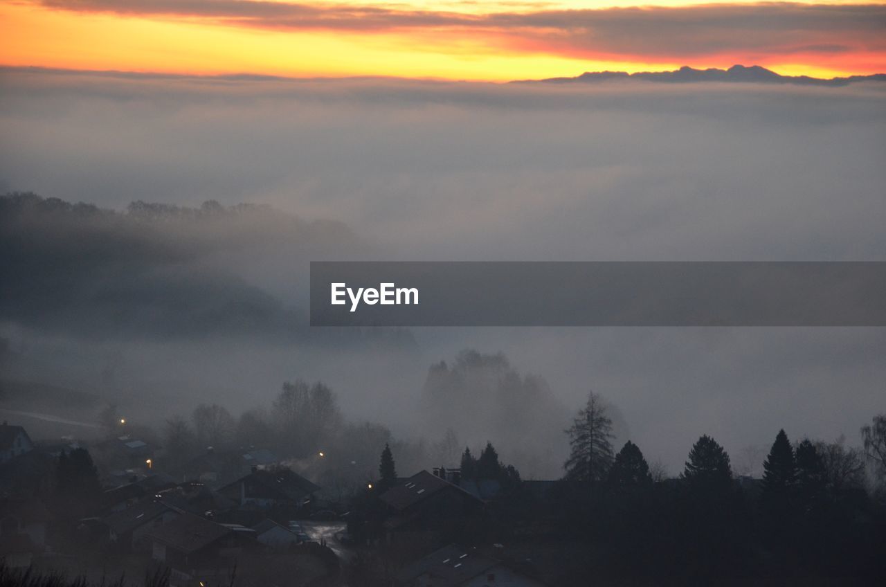 Scenic view of landscape against sky during sunset