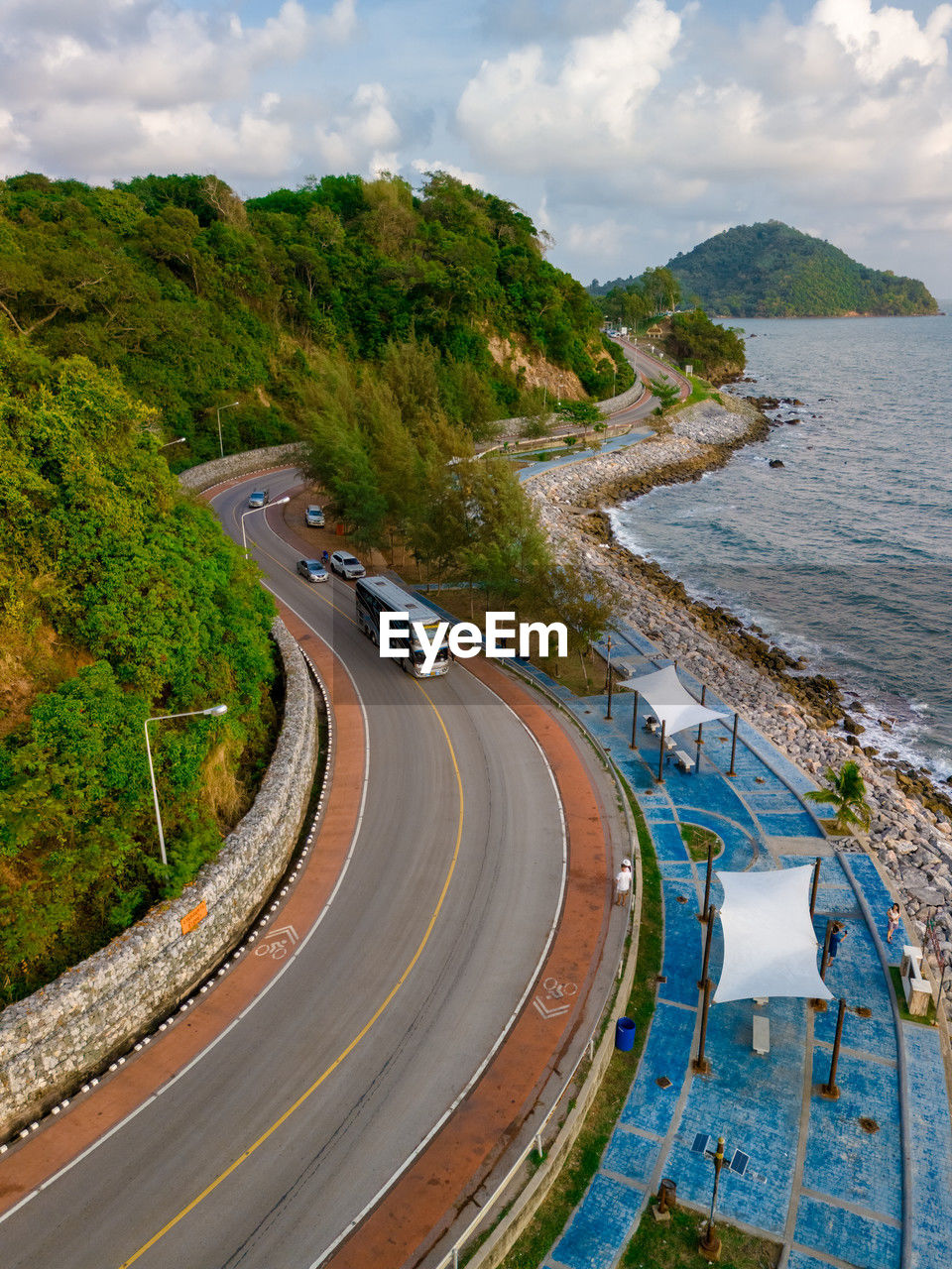 high angle view of road by lake against sky