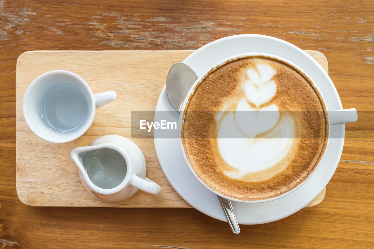 Close-up of cappuccino on table 