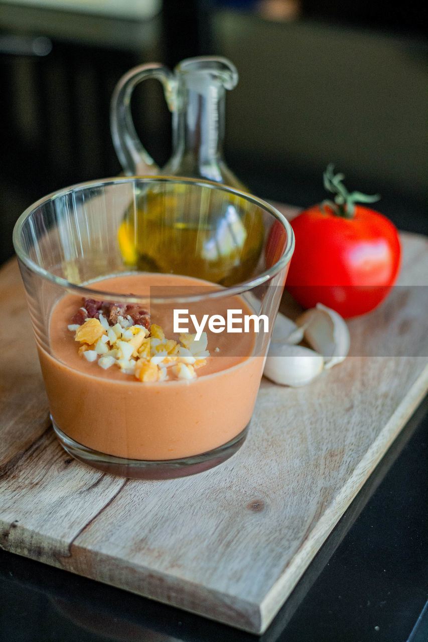 food and drink, food, healthy eating, dish, freshness, vegetable, meal, wellbeing, fruit, indoors, wood, produce, breakfast, no people, cutting board, kitchen, household equipment, domestic room, dairy, tomato, bowl, spice