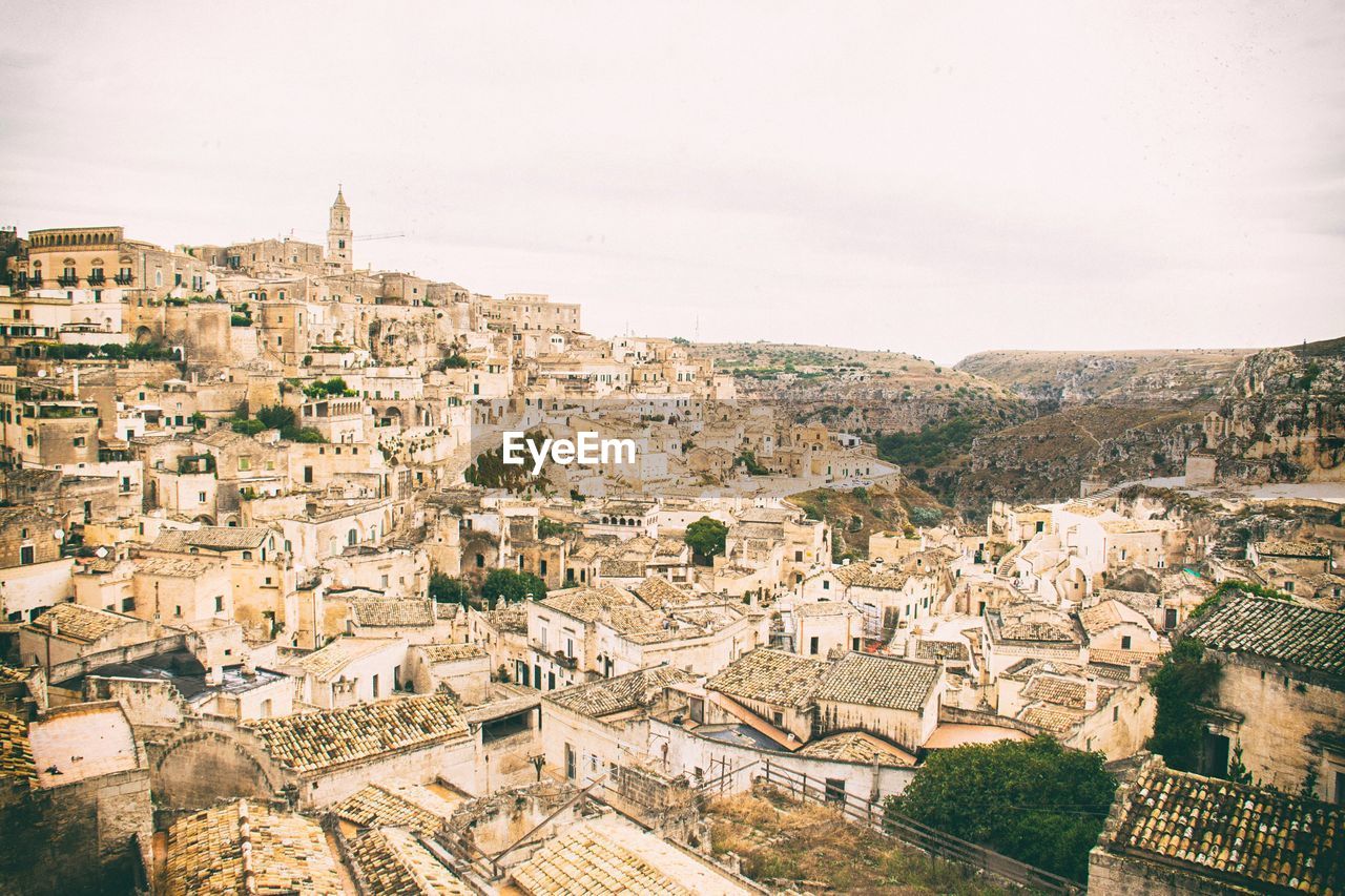 Aerial view of sassi di matera against sky