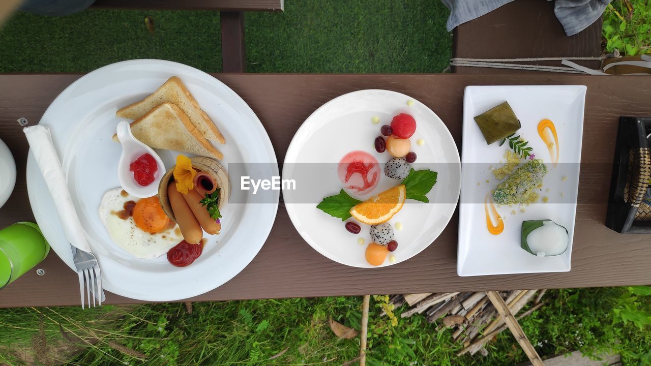 DIRECTLY ABOVE SHOT OF MEAL SERVED ON TABLE