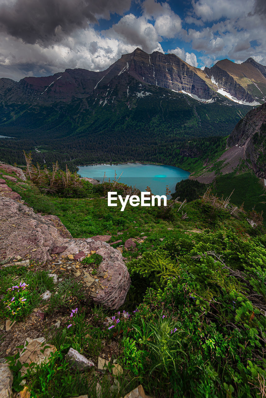 SCENIC VIEW OF MOUNTAINS AND SKY
