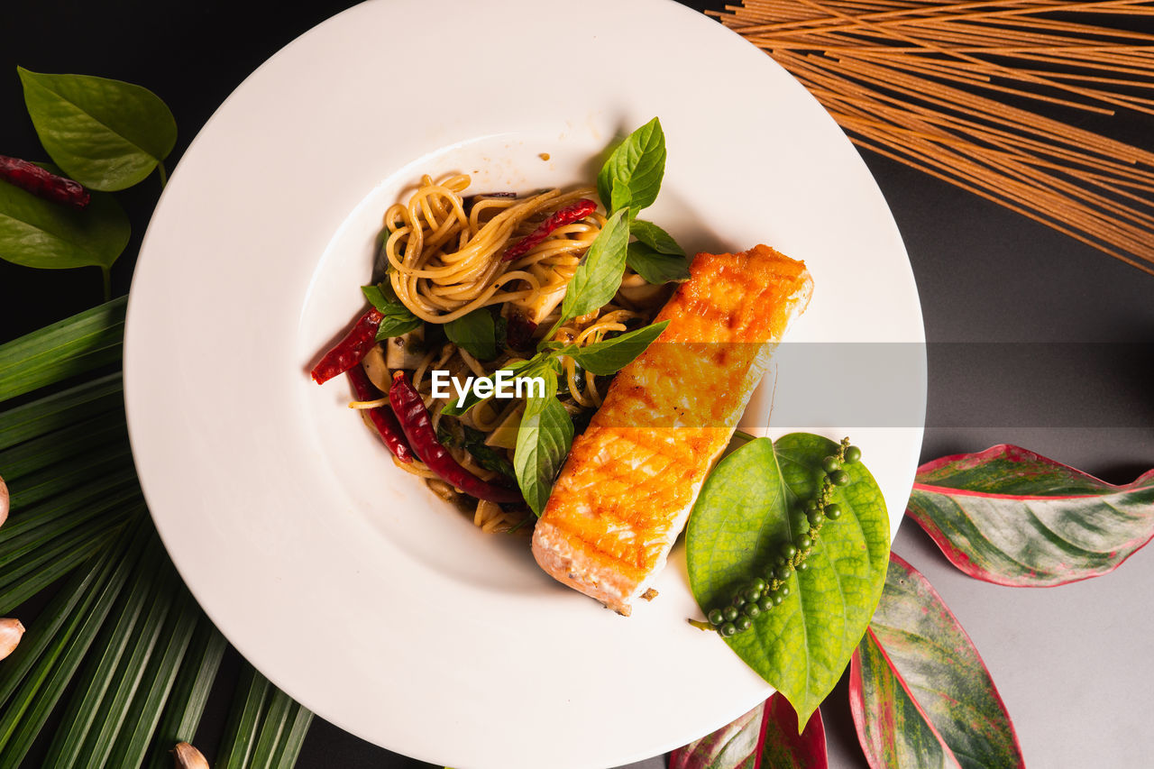 Directly above shot of pasta in plate on table