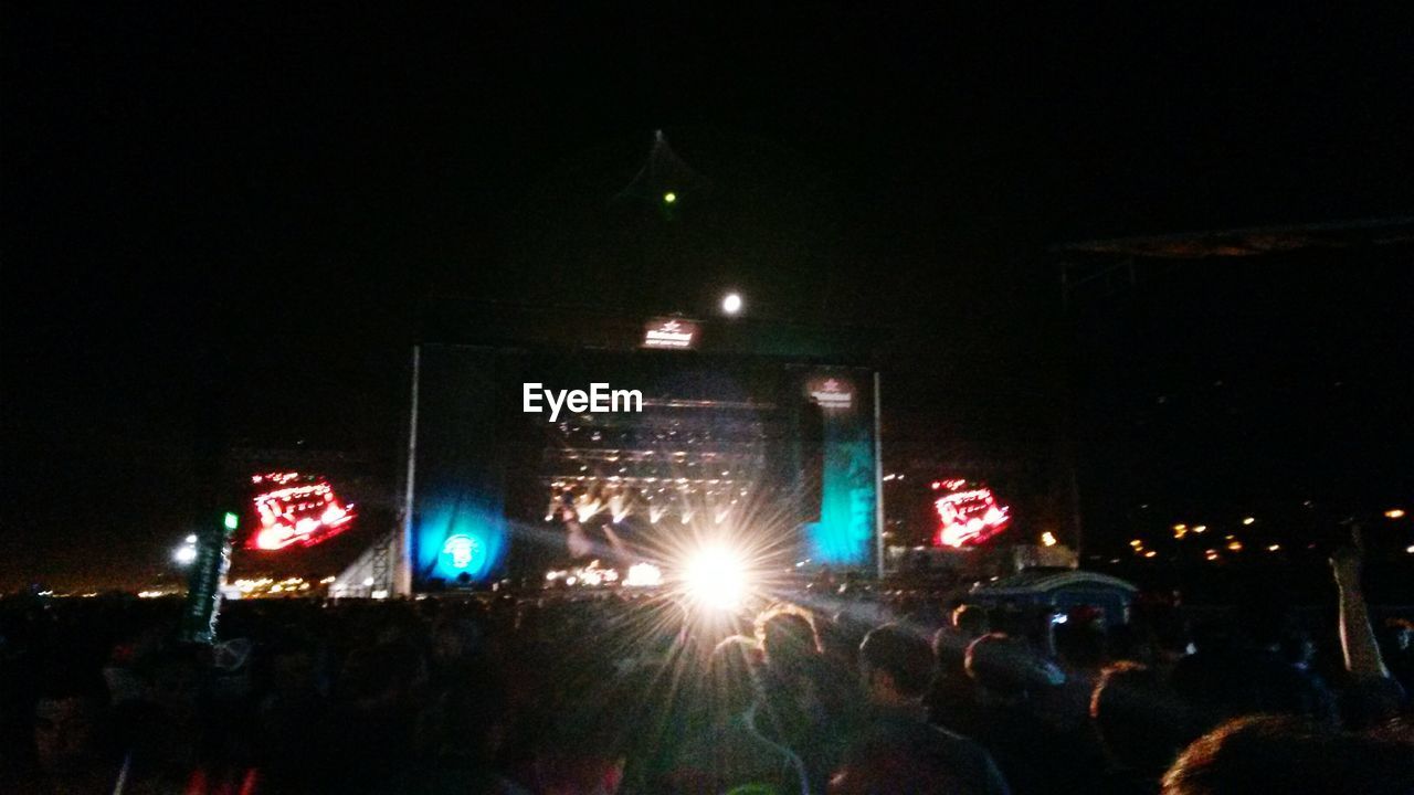 VIEW OF ILLUMINATED STREET LIGHTS IN CITY