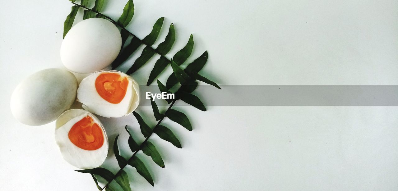 High angle view of eggs in container on table