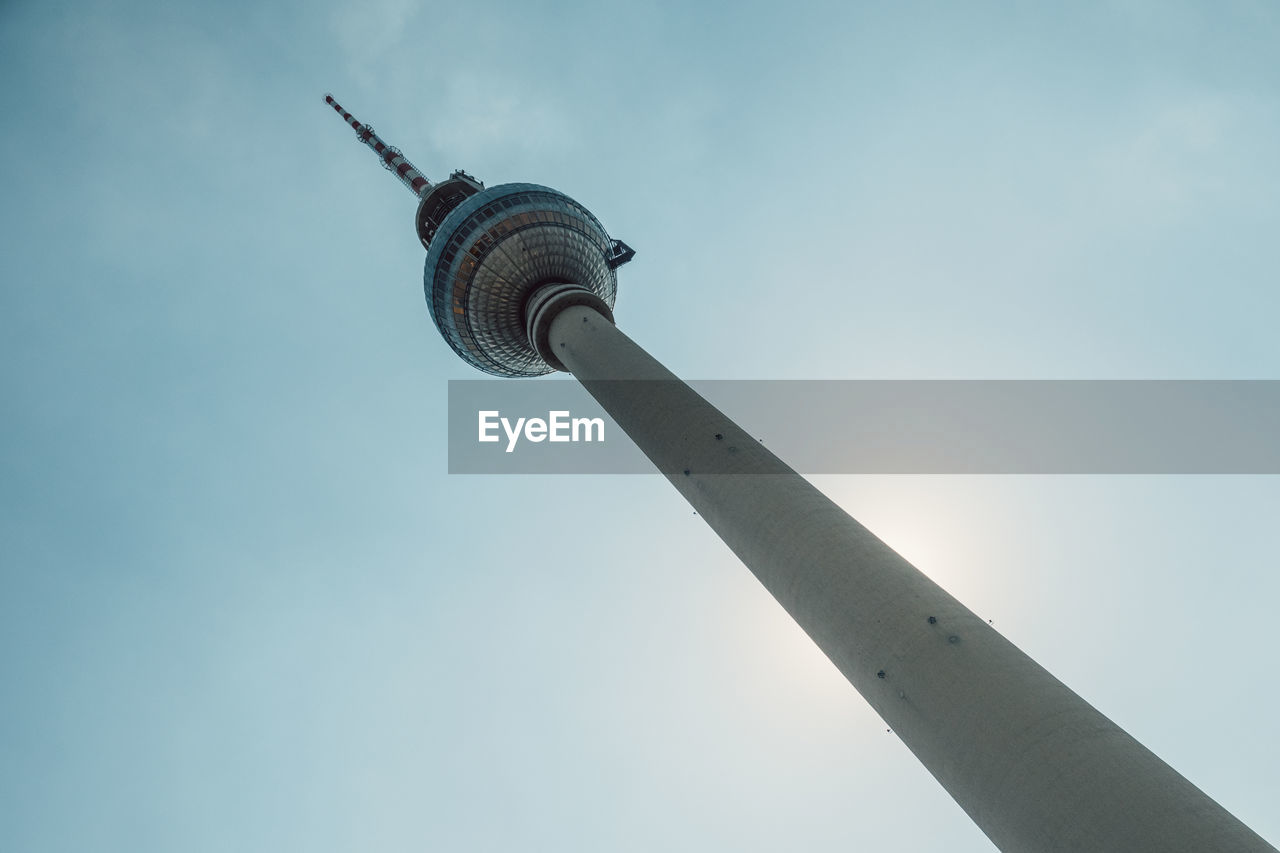 Low angle view of fernsehturm against sky in city