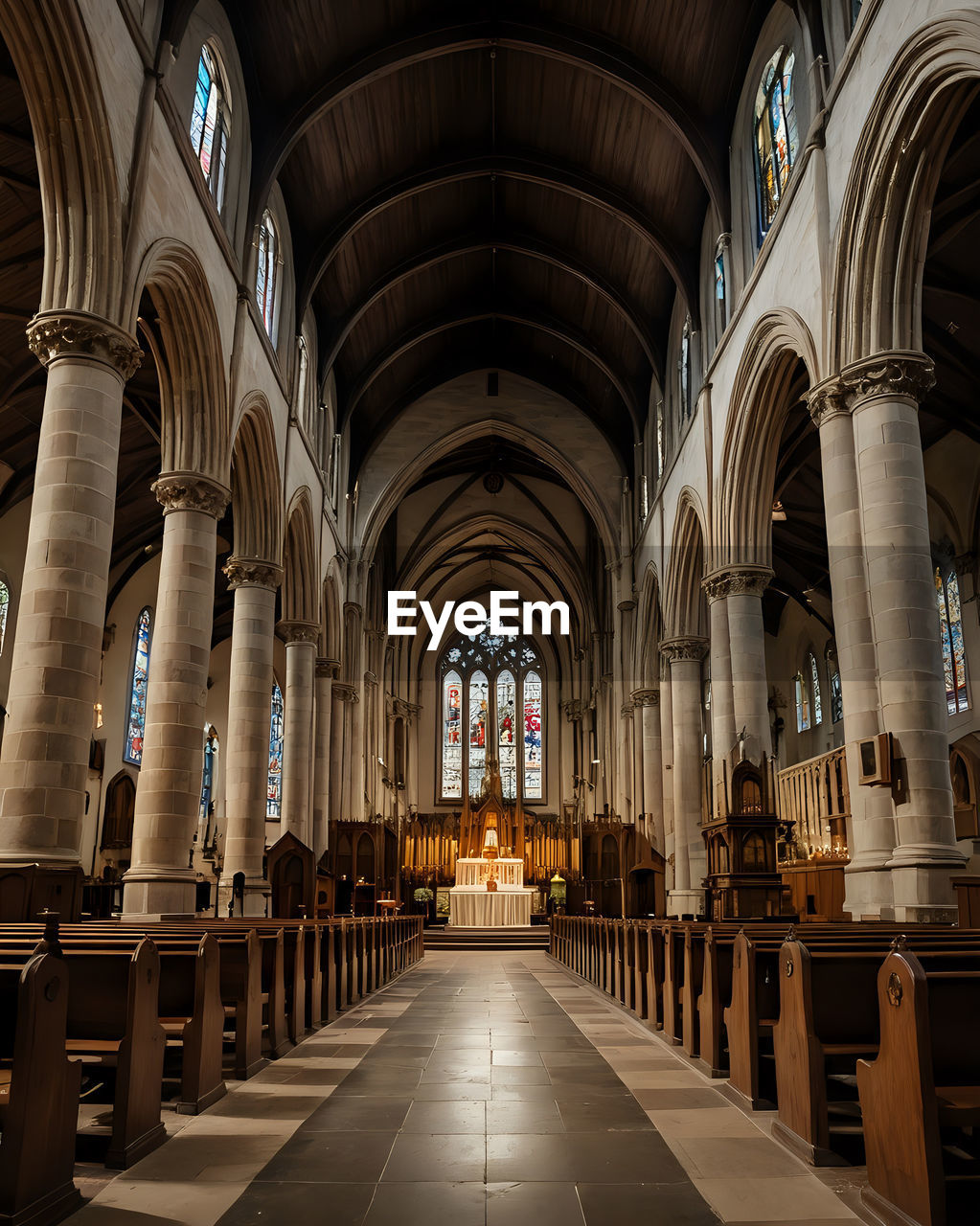 architecture, built structure, religion, arch, place of worship, spirituality, belief, building, indoors, aisle, catholicism, pew, architectural column, worship, history, the past, travel destinations, ceiling, no people, arcade, window, seat, travel, in a row, architectural feature, bench